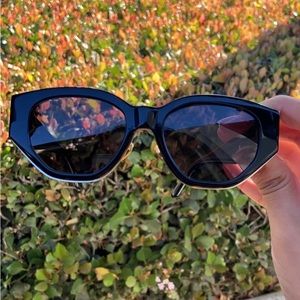 Dezi sunglasses in charge it.